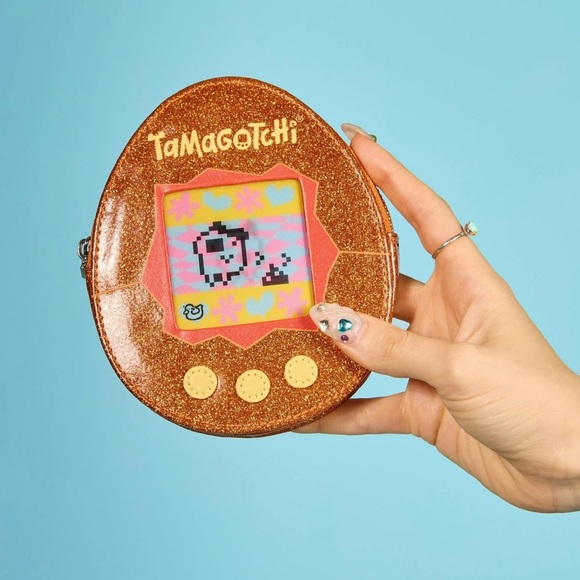 Cakeworthy X Tamagotchi Orange Glitter Zip Pouch - Picture 4 of 9